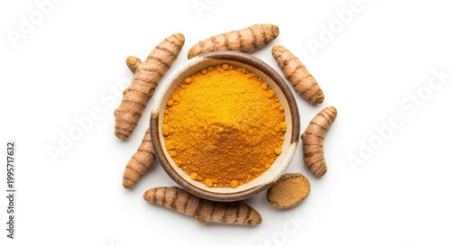 Turmeric powder and roots in a bowl isolated on white background