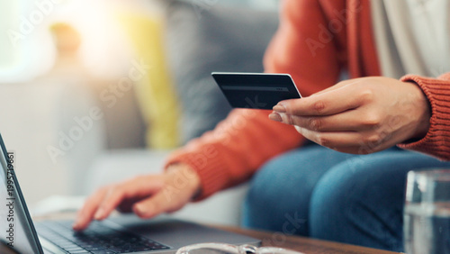 Картината върху платно Credit card, laptop and hands of woman on sofa for online shopping, digital subscription or internet payment