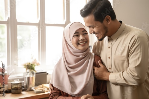 Happy Eid Indonesian Muslim Couple Celebrating in Traditional Attire at Kitchen Indoor Photo. Fictional Character Created By Generative AI