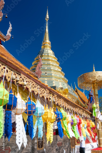 Golden stupa of Wat Phra That Doi Suthep temple in Thailand, richly decorated Buddhist structure with statues and ornate details, spiritual landmark in Chiang Mai