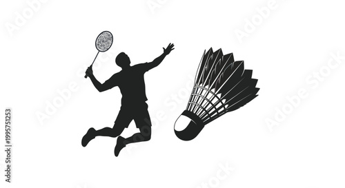 Silhouette of an athletic male badminton player jumping to hit a shuttlecock