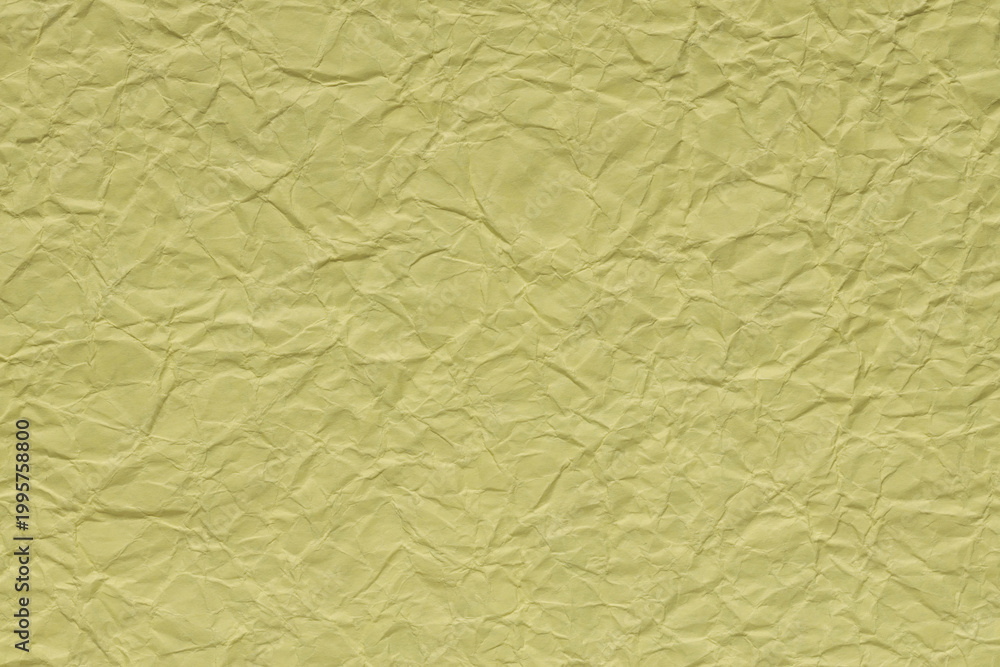 Fototapeta premium Crumpled yellow paper texture background with wrinkles and folds for creative design