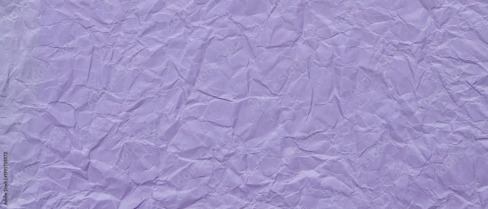 Fototapeta premium Crumpled purple paper texture with wrinkled surface creating abstract pattern background