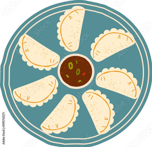 Dumplings with sauce on the plate, top view
