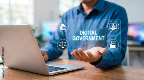 Digital government concept, person using laptop with digital interface showing icons of government services