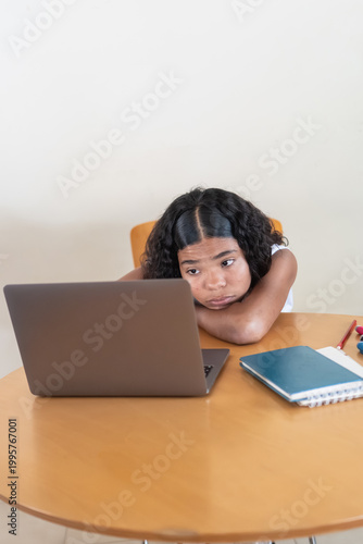 Quadro su tela Young student feeling bored during online learning class