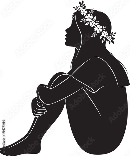 Silhouette of a woman with a flower crown sitting with knees to chest, feminine