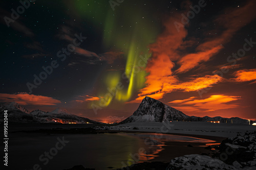 Aurora borealis on sky at Flakstad island, Lofoten islands