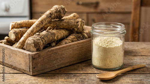 Fresh horseradish roots with grated powder in bowl on rustic wooden table, natural light kitchen scene, healthy ingredient for cooking, detox, nutrition and organic food preparation concept!