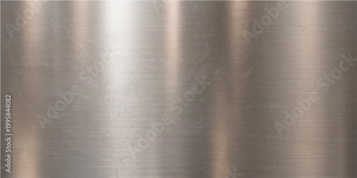 A sleek metallic surface with subtle textures, reflecting light with soft gradient.