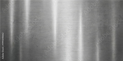 A sleek, modern metallic surface features brushed texture. the light reflects across its polished expanse, revealing subtle striations. 