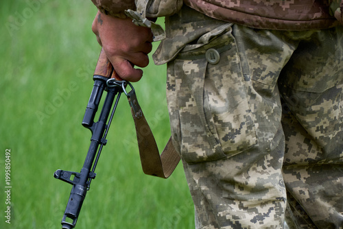 Soldier standing with a gun