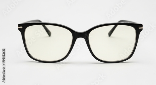 Stylish black framed eyeglasses with clear lenses on a white background.