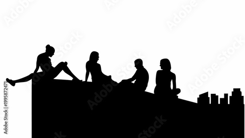 Silhouettes of people sitting on a wall