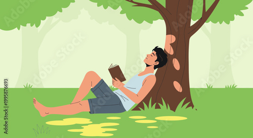 Young man relaxing reading book under tree in park, enjoying nature and leisure time