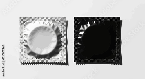 Two Condom Packets, One Silver, One Black, Isolated on White Background
