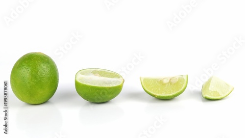 Фотография Fresh sliced lime isolated on white background