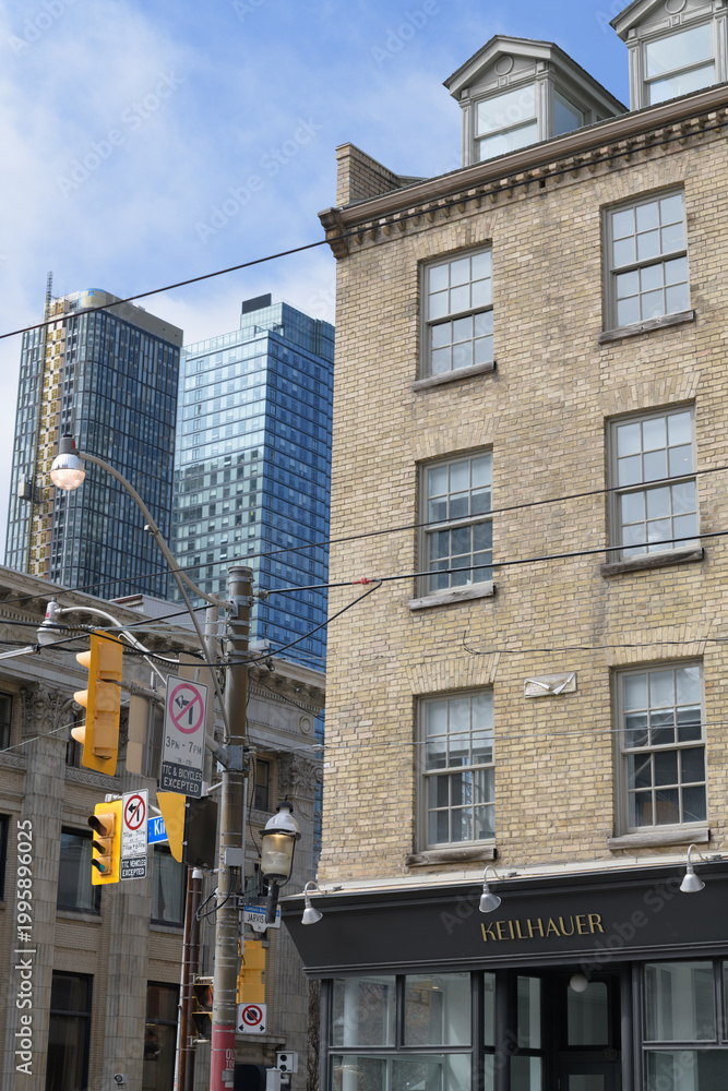 Fototapeta premium exterior building facade and sign of Keilhauer, a showroom for a furniture manufacturer, located at 150 King St E, Toronto