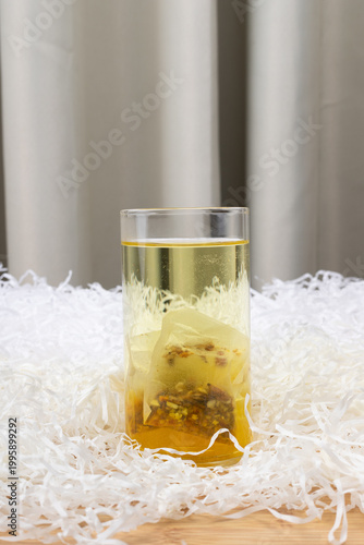 Red bean, jujube and red sorghum tea in a glass cup