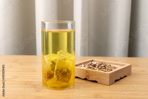 Red bean, jujube and red sorghum tea in a glass cup