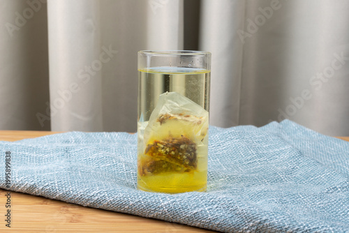 Red bean, jujube and red sorghum tea in a glass cup