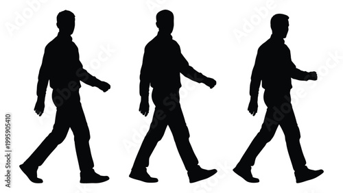Fotografie Three silhouetted figures are shown walking each in a different stage of stride