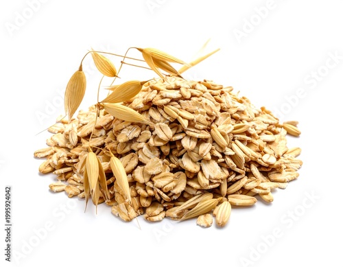 Pile of oat flakes with oat heads