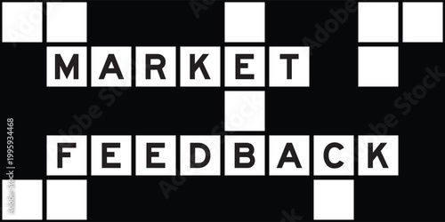 Alphabet letter in word market feedback on crossword puzzle background