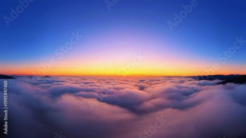 a panoramic sunrise with clean sky and fog layers 