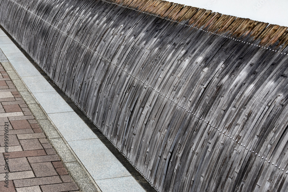 Fototapeta premium Traditional style wooden fence with weathered texture