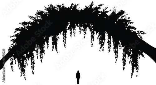 Lone figure stands beneath a dramatic, arching silhouette of dense foliage