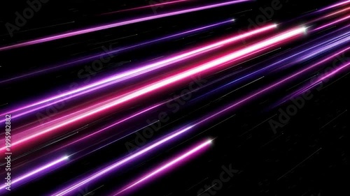 Abstract neon light streaks and speed lines moving across a dark background.