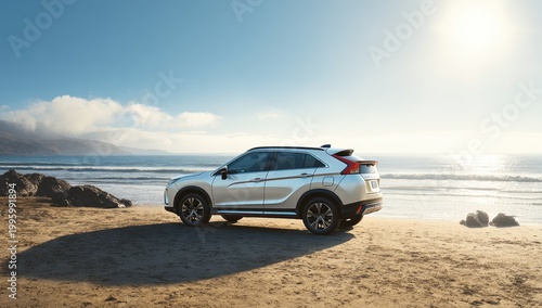 White Mitsubishi Eclipse Cross parked on a sandy beach with ocean waves in the background.