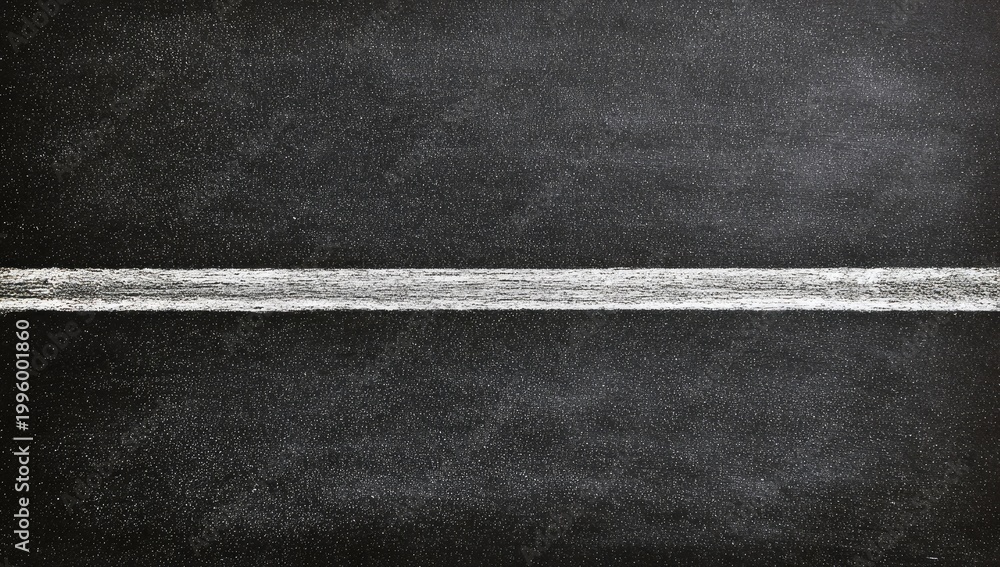Fototapeta premium A Textured Chalk Line Drawn Across a Dark Chalkboard Surface.
