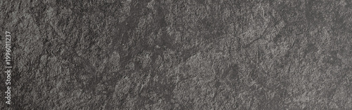 Fotografi Dark gray slate background presenting a rough stone texture with a natural rocky
