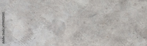 Photos Gray concrete surface forming a textured abstract background, displaying a rough