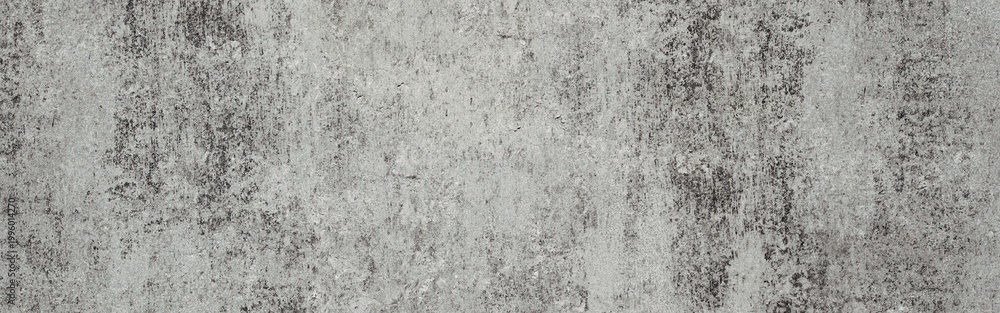 Obraz premium Gray concrete wall texture background creating an industrial aesthetic, featuring rough grainy surface patterns with weathered cement details and peeling paint effects