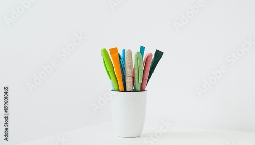 colored pencils in a glass