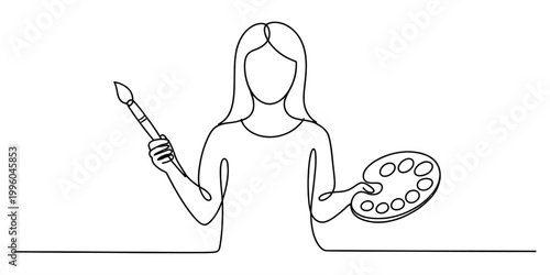 Woman artist holding a paintbrush and a paint palette