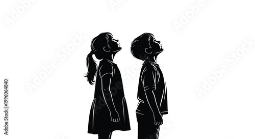 A young boy and girl in silhouette, looking upwards with wonder and anticipation.