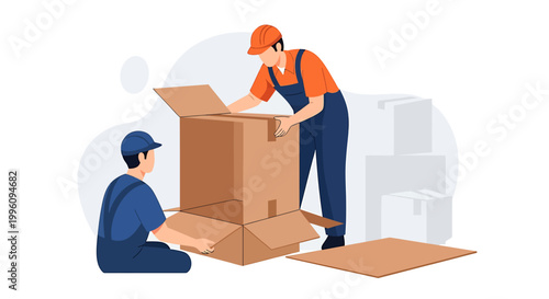 Two movers packing a large cardboard box for shipping.