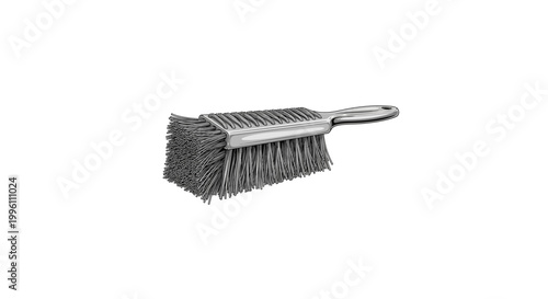 Close-up of a gray cleaning brush with stiff bristles and a handle.