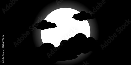 Full moon silhouette behind clouds with dark atmosphere and bright shining light in the night sky
