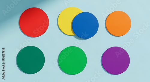 Colorful Flat Lay Circular Coasters on Light Blue Background