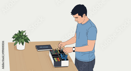 Man organizing small parts in a desk organizer, focused on a task