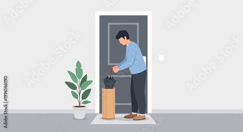 Man putting umbrella in stand by the door before leaving home