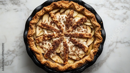 Delicious spiced apple pie with golden streusel topping, a comforting dessert for autumn and festive occasions.