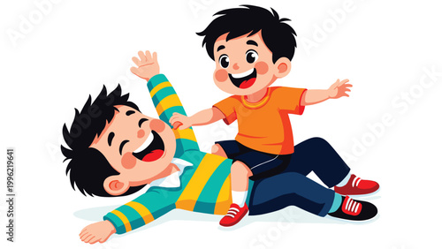 Two cheerful young brothers playing together and laughing while lying on white background.