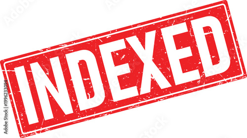 Distressed red rubber stamp impression with the word indexed in white sans serif font