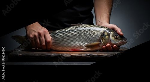 Fresh fish on cutting board ready.